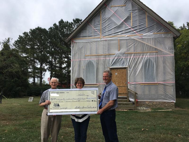 Check prsentation attendees shown are (l-r) Gene Carlisle, Ag Museum volunteer and Adopt-A-Building donor; Karen Hutchison, museum board treasurer; and Grier Stayton, museum board president. SUBMITTED PHOTO